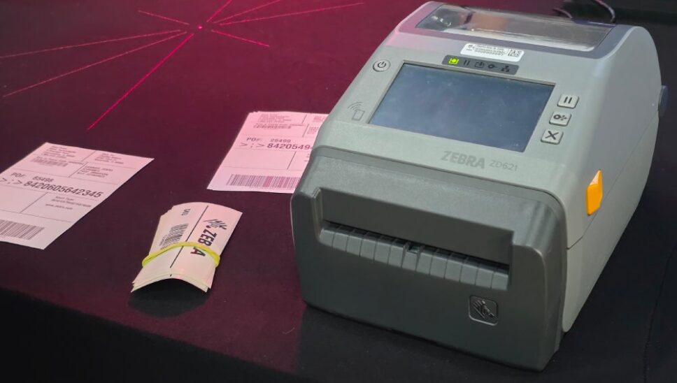Scanner e impressora de etiquetas adesivas